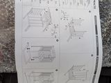 a sheet of paper with instructions on it sitting on the floor