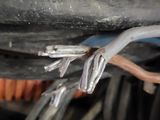a close up of a wire with wires attached to it