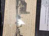 a picture of a picture of a building in a case
