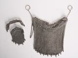 an image of a chain mail bag and a purse on a white surface