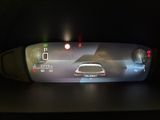 a picture of a car dashboard with a digital display