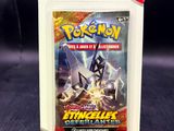 a close up of a box of pokemon trading cards on a table