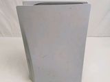 a gray vase with a black lid on a white background