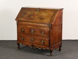 a small wooden desk with a drawer on it