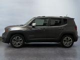 the jeep renegade is parked in a room with a gray floor