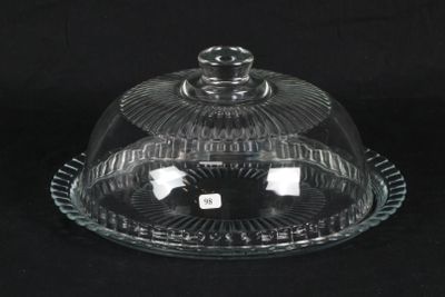 a glass dome with a lid on a black background