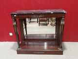 a wooden table with a marble top on it