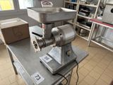 a machine that is sitting on a table in a kitchen