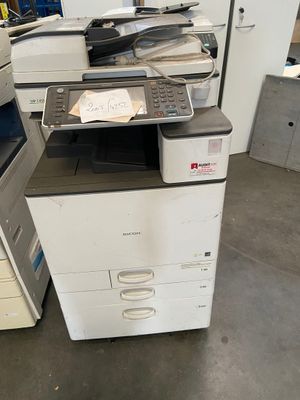 a printer that is sitting on top of a desk