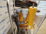 an image of a truck with a hose attached to it ' s side