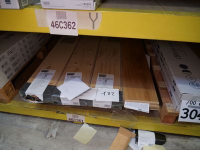 many boxes of wood on the shelves in the store