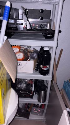 a shelf that has a lot of items on it