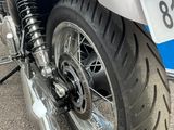 a close up of a motorcycle with a license plate on it