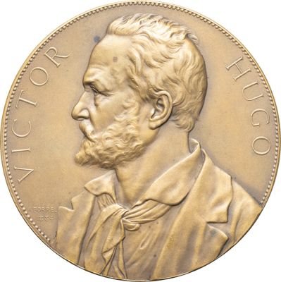 une image montrant un gros plan d'une pièce de monnaie sur laquelle figure le visage d'un homme
