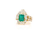 an emerald and diamond ring