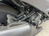 a close up view of a motorcycle engine and its gear