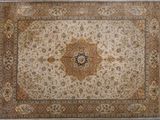 une image représentant un tapis orné d'un motif en médaillon