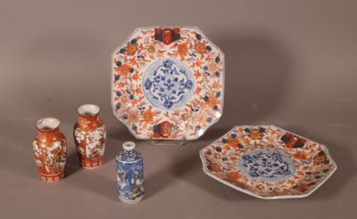 trois types différents d'assiettes et de vases sur la table