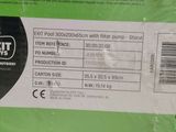 the back of a green plastic bag with a black and white label on it