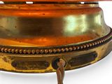 a close up view of a lamp with a wooden base