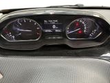 a close up of a car dashboard with a speedometer