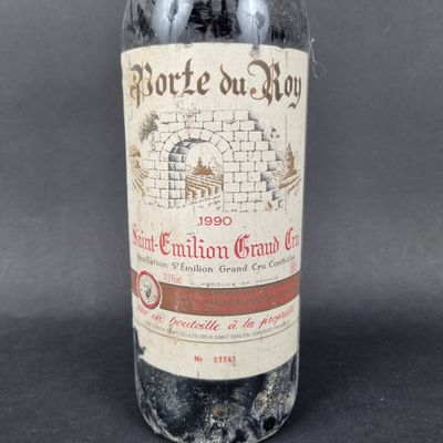 a bottle of wine that is sitting on a table