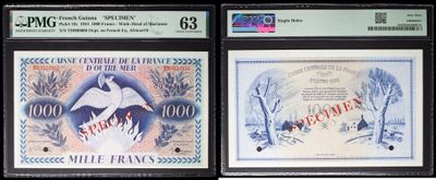 three different types of paper money are on display in a display case