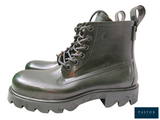 a close up of a pair of boots on a white background