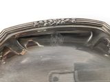 a silver tray that has a silver handle on it