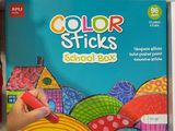 brightly colored stickers in a box on a shelf in a store