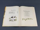 an open book with a picture of a cow on it