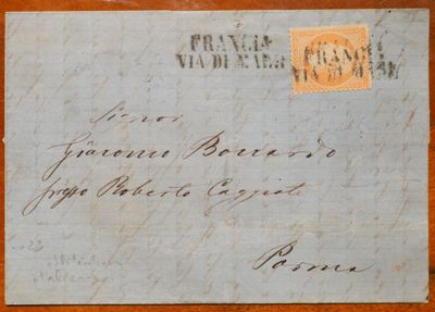 un gros plan d'un morceau de papier sur lequel est apposé un timbre