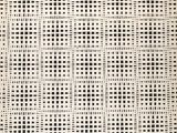a black and white checkered pattern on a beige background