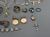 many different types of jewelry on the table