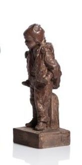 a statue of a man standing next to a bottle of wine