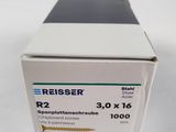 a close up of a box of pills on a white surface