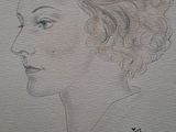 drawing of a woman in profile with her head turned to the side