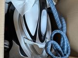 a box with a helmet and a rope in it