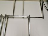 a white counter top with four metal frames on it