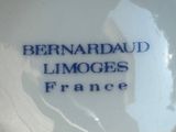 a close up of a plate with the words bernardaud limoges france on it
