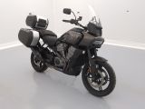 a motorcycle that is parked in a white room