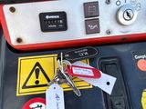 a close up of a machine with a lot of stickers on it