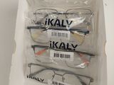 three pairs of glasses in a box on the table