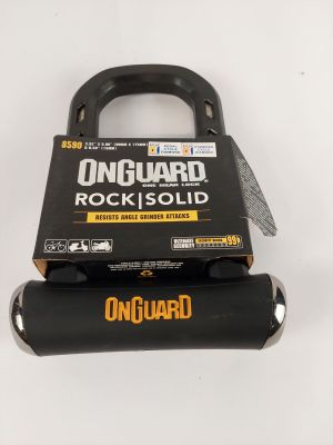 a close up of a lock on a white background with a box
