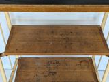 a wooden shelf with two shelves on top of it