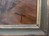 a picture of a painting of a man with a cross on it
