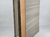 a book with a wooden cover sitting on top of a table