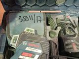 a tool box with tools inside of it on the floor