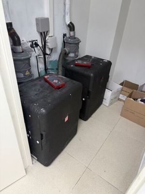 three suitcases that are sitting in the corner of a room