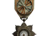 une image représentant une médaille avec une étoile au recto et une autre médaille au verso